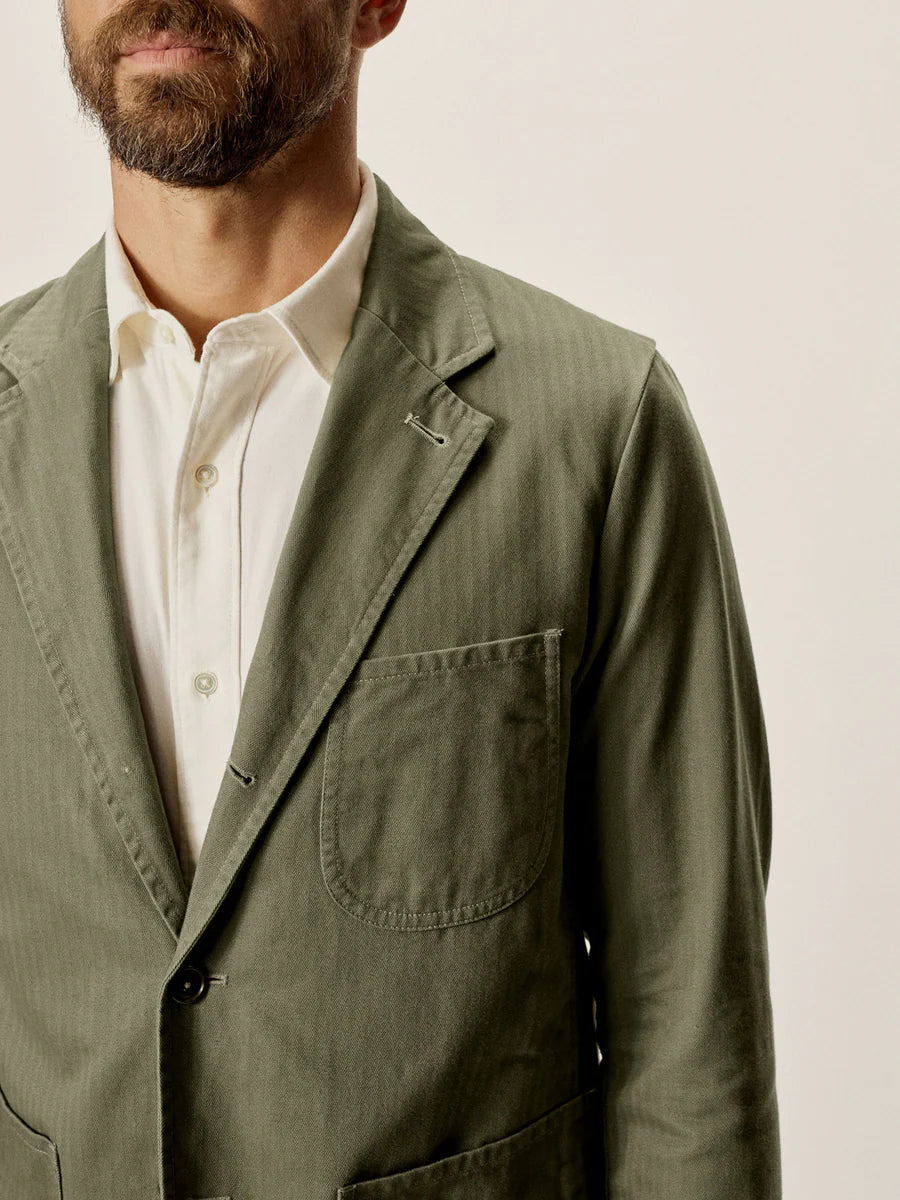 Buck Mason - BUCK MASON HERRINGBONE TWILL CARRY-ON JACKET IN FATIGUE DUSTY OLIVE - Rent With Thred