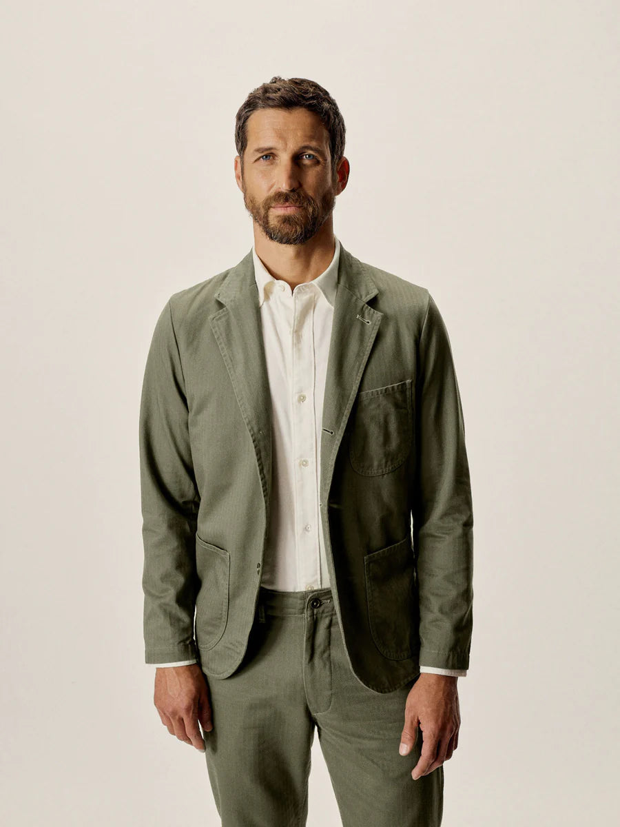 Buck Mason - BUCK MASON HERRINGBONE TWILL CARRY-ON JACKET IN FATIGUE DUSTY OLIVE - Rent With Thred